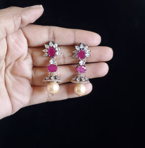 Hrushmitha Cz Jhumkis With Black Rose Plating NV11 Ruby